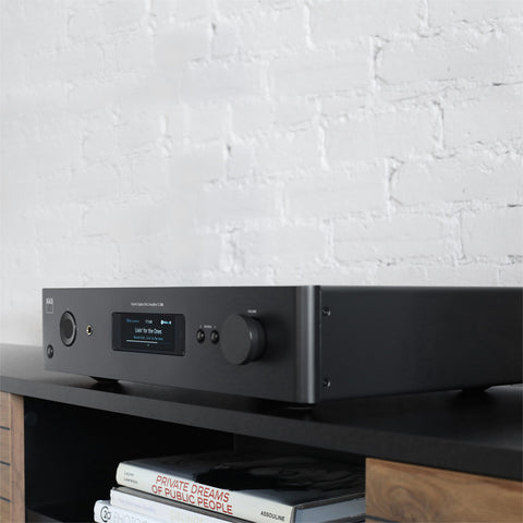 NAD C389 Amplifier on credenza - close up