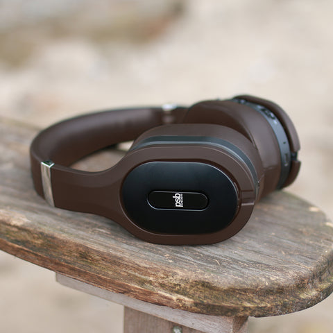 PSB M4U 8 MKII Headphones Espresso Brown on a Muskoka chair
