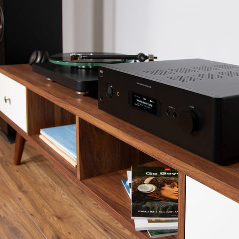 NAD C399 Amplifier beside NAD Turntable on credenza
