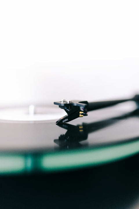 NAD C558 turntable close up of stylus on vinyl LP