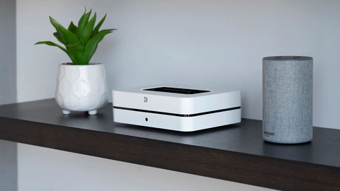 bluesound powernode on a shelf