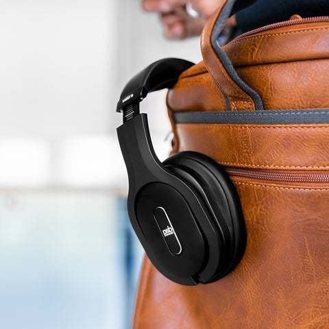 PSB M4U 9 Headphones in a travel bag
